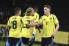 Sweden's Viktor Gyoekeres, right, celebrates after scoring his side's third goal during the Nations League, Group C1, soccer match between Sweden and Azerbaijan in Solna, near Stockholm, Sweden, Tuesday, Nov. 19, 2024. (Claudio Bresciani/TT News Agency via AP)