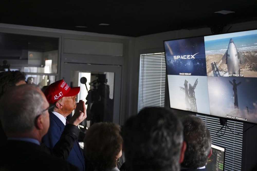 President-elect Donald Trump listens as Elon Musk explains the operations ahead of the launch of the sixth test flight of the SpaceX Starship rocket Tuesday, Nov. 19, 2024 in Boca Chica, Texas. (Brandon Bell/Pool via AP)