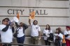 Members of immigration advocacy groups demand the City Council enact an ordinance making Los Angeles into a sanctuary city outside Los Angeles City Hall in Los Angeles on Tuesday, Nov. 19, 2024. (AP Photo/Damian Dovarganes)