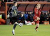 Canada forward Jacob Shaffelburg (14) is tackled hard by Suriname defenders Leo Abena (12) and Liam Van Gelderen (2) in CONCACAF Nations League action in Toronto, Tuesday, Nov. 19, 2024. THE CANADIAN PRESS/Frank Gunn