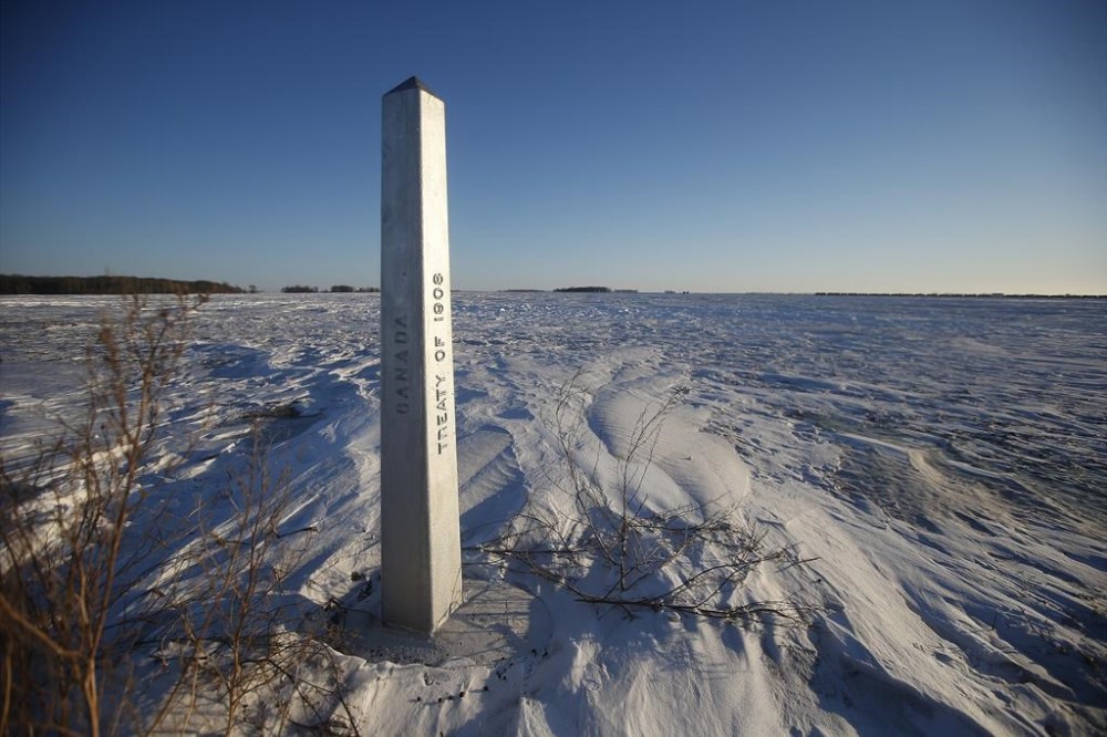 A border marker, between the United States and Canada is shown just outside of Emerson, Man., Thursday, Jan. 20, 2022. THE CANADIAN PRESS/John Woods