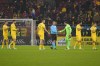 Romania's goalkeeper Florin Nita shakes hands with referee Morten Krogh of Denmark after the UEFA Nations League soccer match between Romania and Kosovo was suspended at the National Arena stadium in Bucharest, Romania, Saturday, Nov. 16, 2024. (AP Photo/Alexandru Dobre)