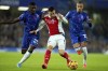 Chelsea's Moises Caicedo, left, vies for the ball with Arsenal's Gabriel Martinelli during the English Premier League soccer match between Chelsea and Arsenal at Stamford Bridge stadium in London, Sunday, Nov. 10, 2021. (AP Photo/Kirsty Wigglesworth)