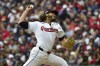FILE - Cleveland Guardians' Eli Morgan pitches in the seventh inning during Game 5 of baseball's American League Division Series, Oct. 12, 2024, in Cleveland. (AP Photo/Phil Long, File)