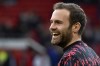 FILE - Manchester United's Juan Mata smiles during the warm up before the English Premier League soccer match between Manchester United and Tottenham Hotspur, at the Old Trafford stadium in Manchester, England, March 12, 2022. (AP Photo/Rui Vieira, File)