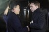 FILE - Russia's natural resources minister Alexander Kozlov, right, is greeted by Yun Jong Ho, minister of External Economic Relations, as the Russian delegation leave Pyongyang Airport in Pyongyang, on Nov. 16, 2023. (AP Photo/Jon Chol Jin, File)
