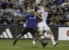 CF Montreal's Josef Martinez battles San Jose Earthquakes' Daniel Munie during first half MLS soccer action in Montreal, Saturday, September 28, 2024. CF Montréal will not exercise the contract options of nine players including leading scorer Josef Martinez, the Major League Soccer club announced Thursday. THE CANADIAN PRESS/ Peter McCabe