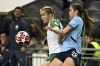 Hammarby's Julie Blakstad and Manchester City's Gracie Prior in action during the women's Champions League soccer match between Hammarby IF and Manchester City at Tele2 Arena, Stockholm, Sweden, Thursday Nov. 21, 2024. (Claudio Bresciani/TT via AP)