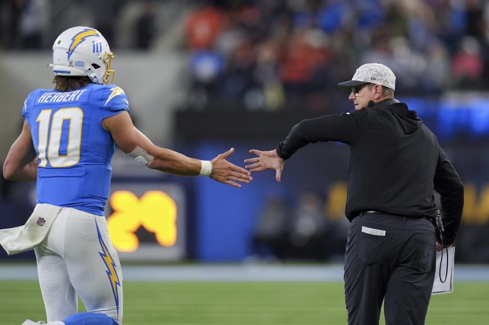 AFC standouts meet when Herbert, Chargers host Jackson’s Ravens on