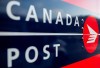 Canada Post says it lost $315 million before tax in the third quarter compared with a loss before tax of $290 million a year earlier.Canada Post signage is seen during a national strike action in Ottawa, on Monday, Nov. 18, 2024. THE CANADIAN PRESS/Spencer Colby