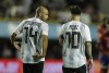 FILE - Argentina's Javier Mascherano, left, and Lionel Messi talk after Messi scored during a friendly soccer match between Argentina and Haiti in Buenos Aires, Argentina, on May 29, 2018. (AP Photo/Victor R. Caivano, File)