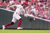FILE - Cincinnati Reds' Jonathan India fields a ground ball hit by Pittsburgh Pirates' Oneil Cruz during the fifth inning of a baseball game, Sept. 22, 2024, in Cincinnati. (AP Photo/Kareem Elgazzar, File)
