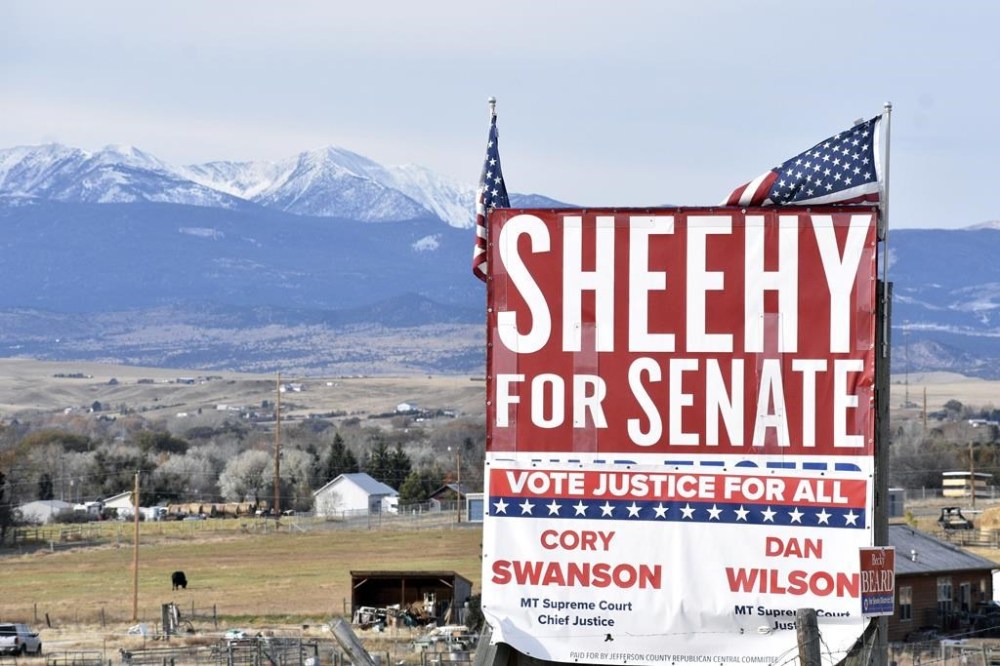 A sign for Republican Tim Sheehy's U.S. Senate campaign is seen along U.S. Interstate 90 on Nov. 1, 2024, near Whitehall, Mont. (AP Photo/Matthew Brown)
