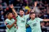 Moenchengladbach's Tim Kleindienst, centre, celebrates with Julian Weigl, right, and Alassane Plea after scoring his side's second goal during the German Bundesliga soccer match between Borussia Moenchengladbach and FC St. Pauli at the Borussia Park in Moenchengladbach, Germany, Sunday, Nov. 24, 2024. (David Inderlied/dpa via AP)