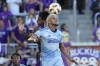 Atlanta United's Luis Abram, center right, and Orlando City's Facundo Torres, center left, go up for control of a head ball during the first half of an MLS Semifinal Conference playoff soccer match, Sunday, Nov. 24, 2024, in Orlando, Fla. (AP Photo/John Raoux)