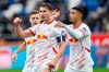 Leipzig's Willi Orban, front, celebrates after scoring the opening goal during the German Bundesliga soccer match between TSG 1899 Hoffenheim and RB Leipzig in Sinsheim, Germany, Saturday, Nov. 23, 2024. (Uwe Anspach/dpa via AP)