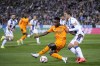 Leganes' Sergio Gonzalez, right, fights for the ball with Real Madrid's Vinicius Junior during a Spanish La Liga soccer match between CD Leganes and Real Madrid in Leganes, outside Madrid, Sunday, Nov. 24, 2024. (AP Photo/Bernat Armangue)