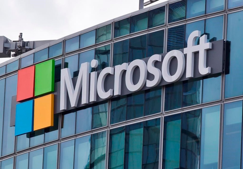 FILE - This April 12, 2016 file photo shows the Microsoft logo in Issy-les-Moulineaux, outside Paris. (AP Photo/Michel Euler, File)