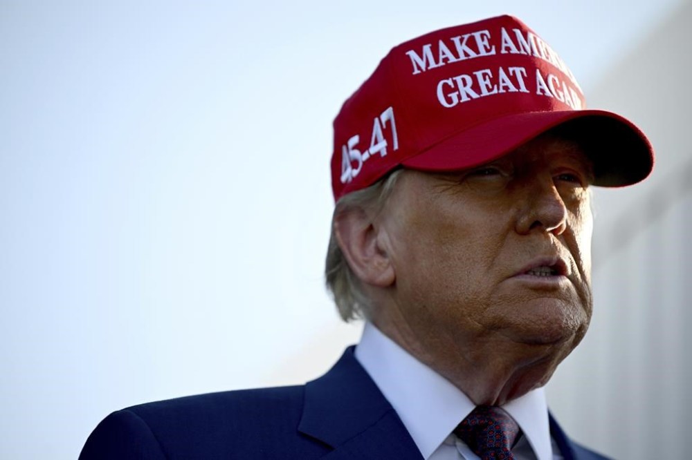 Donald Trump says he will sign an executive order imposing a 25 per cent tariff on all products coming in to the United States from Canada and Mexico. Here, president-elect Donald Trump arrives before the launch of the sixth test flight of the SpaceX Starship rocket Tuesday, Nov. 19, 2024 in Boca Chica, Texas. THE CANADIAN PRESS/Brandon Bell/Pool via AP