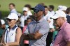 FILE - Tiger Woods watches his son Charlie Woods during the second round of stroke play at the U.S. Junior Amateur Golf Championship on July 23, 2024, in Bloomfield Township, Mich. (AP Photo/Carlos Osorio, File)