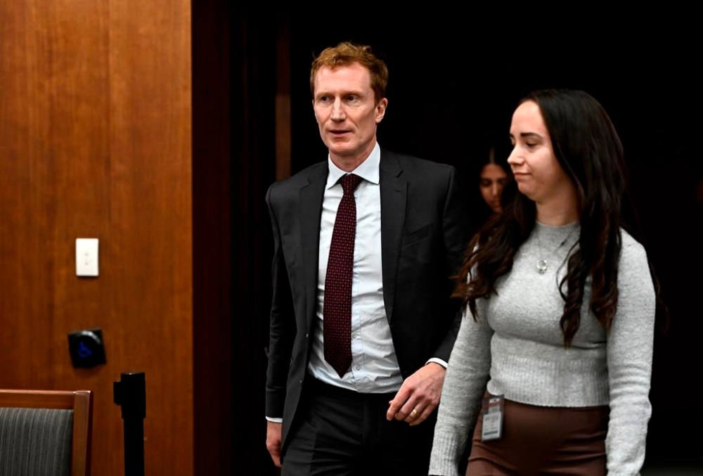 Minister of Immigration, Refugees and Citizenship Marc Miller arrives to appear before the Standing Committee on Citizenship and Immigration, in West Block on Parliament Hill in Ottawa, on Monday, Nov. 25, 2024. THE CANADIAN PRESS/Justin Tang