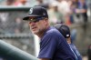FILE - Seattle Mariners third base coach Manny Acta watches from the dugout during the first inning of a baseball game against the Detroit Tigers, Thursday, Aug. 15, 2024, in Detroit. (AP Photo/Carlos Osorio, File)