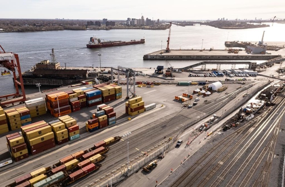 An aerial view shows a ship sailing through the Port of Montreal in Montreal, Thursday, Nov. 14, 2024. THE CANADIAN PRESS/Christinne Muschi