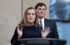 Minister of Public Safety, Democratic Institutions and Intergovernmental Affairs Dominic LeBlanc looks on as Deputy Prime Minister and Minister of Finance Chrystia Freeland speaks to reporters following cabinet meeting on Parliament Hill, in Ottawa, Tuesday, Nov. 26, 2024. THE CANADIAN PRESS/Adrian Wyld