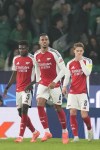 Arsenal's Gabriel (6) celebrates after scoring his side's 3nd goal against Sporting during the Champions League opening phase soccer match at the Alvalade stadium in Lisbon, Tuesday, Nov. 26, 2024. (AP Photo/Armando Franca)