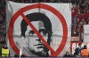Munich fans hold up a banner against Nasser Al-Khelaifi, President of Paris Saint-Germain during the soccer match between FC Bayern and Paris Saint Germain, at the Allianz Arena in Munich, Germany, Tuesday, Nov. 26, 2024. (Tom Weller/dpa via AP)