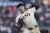 FILE - San Francisco Giants pitcher Blake Snell works against the Atlanta Braves during the first inning of a baseball game in San Francisco, Aug. 12, 2024. (AP Photo/Jeff Chiu, File)