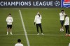 PSG's goalkeeper Matvey Safonov, center, laughs during a training session in Munich, Germany, Monday, Nov. 25, 2024, ahead of the Champions League opening phase soccer match between FC Bayern and PSG. (AP Photo/Matthias Schrader)
