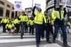 A group of striking Canada Post employees march in Montreal, Monday, Nov. 25, 2024. THE CANADIAN PRESS/Christinne Muschi
