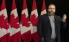 President of the Automotive Parts Manufacturers’ Association Flavio Volpe speaks to the media at the federal cabinet retreat in Montreal on January 23, 2024. THE CANADIAN PRESS/Christinne Muschi