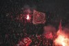 Supporters of Red Star celebrate after Mirko Ivanic scored his side's third goal during the Champions League opening phase soccer match between Red Star and Stuttgart at the Rajko Mitic Stadium in Belgrade, Serbia, Wednesday, Nov. 27, 2024. (AP Photo/Darko Vojinovic)