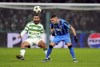 Celtic's Cameron Carter-Vickers, left, and Club Brugge's Ferran Jutgla in action during the UEFA Champions League opening phase soccer stage match at Celtic Park, Glasgow, Scotland, Wednesday Nov. 27, 2024. (Andrew Milligan/PA via AP)