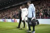 Real Madrid's Eduardo Camavinga leaves the pitch after getting injured during the Champions League opening phase soccer match between Liverpool and Real Madrid at Anfield Stadium, Liverpool, England, Wednesday, Nov. 27, 2024. (AP Photo/Jon Super)