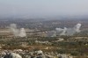 Smoke rises amid fighting between opposition factions and Syrian government troops in Dadikh, Aleppo countryside, Syria, Thursday, Nov. 28, 2024. (AP Photo/Ghaith Alsayed)