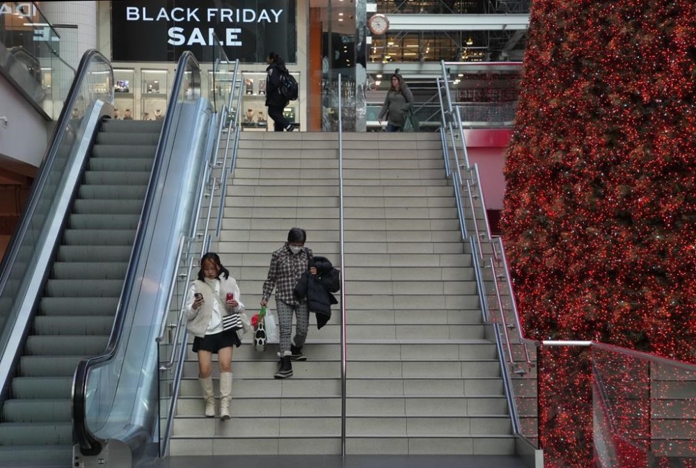 Shoppers track down Black Friday deals at the Eaton Centre in Toronto, Friday, Nov. 24, 2023. THE CANADIAN PRESS/Chris Young