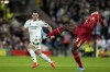 Real Madrid's Brahim Diaz vies for the ball with Liverpool's Ibrahima Konate, right, during the Champions League opening phase soccer match between Liverpool and Real Madrid at Anfield Stadium, Liverpool, England, Wednesday, Nov. 27, 2024. (AP Photo/Jon Super)