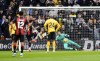 Bournemouth's Justin Kluivert, 3rd left, scores during the English Premier League soccer match at Molineux Stadium, Wolverhampton, England, Saturday Nov. 30, 2024. (Nick Potts/PA via AP)