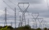 Power lines are seen against cloudy skies near Murvale, Ont., northwest of Kingston, Wednesday, Sept. 7, 2022. THE CANADIAN PRESS/Adrian Wyld
