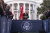 President Joe Biden speaks on the South Lawn of the White House during a ceremony to commemorate World AIDS Day with survivors, their families and advocates, Sunday, Dec. 1, 2024, in Washington. (AP Photo/Manuel Balce Ceneta)