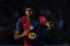 Barcelona's Lamine Yamal gestures during a Spanish La Liga soccer match against Las Palmas at the Lluis Companys Olympic Stadium in Barcelona, Spain, Saturday Nov. 30, 2024. (AP Photo/Joan Monfort)