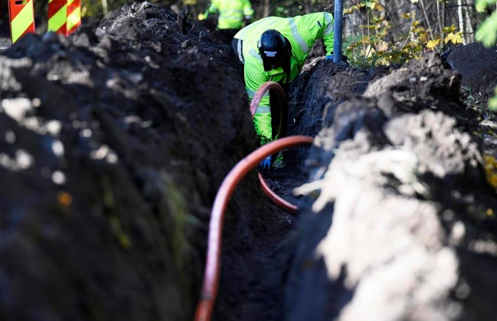 FILE - An optical fibre cable of the Swedish digital infrastructure provider GlobalConnect is being laid underground in Espoo, Finland, Wednesday, Oct. 16, 2024. (Vesa Moilanen/Lehtikuva via AP, File)
