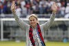 FILE - United States head coach Jill Ellis waves to the crowd as she leaves the field after an international friendly soccer match between the United States and South Korea on Sunday, Oct. 6, 2019, in Chicago. (AP Photo/Kamil Krzaczynski, file)
