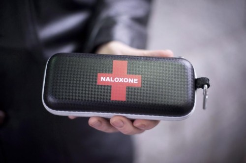 Ontario's auditor general says the province's opioid strategy with its new abstinence-based model for treatment is outdated and does not serve the current needs of the people. A Naloxone anti-overdose kit is held in downtown Vancouver, Friday, Feb. 10, 2017. THE CANADIAN PRESS/Jonathan Hayward