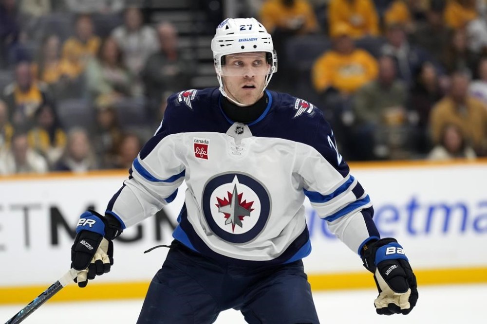 Winnipeg Jets forward Nikolaj Ehlers plays against the Nashville Predators during NHL action Saturday, Nov. 23, 2024, in Nashville, Tenn. The Jets have placed Ehlers on injured reserve with a lower-body injury, the NHL club said Tuesday. THE CANADIAN PRESS/AP/Mark Humphrey