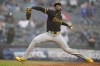 FILE - Pittsburgh Pirates' Aroldis Chapman pitches during the ninth inning of a baseball game against the New York Yankees, Sept. 28, 2024, in New York. (AP Photo/Frank Franklin II, file)