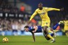 Crystal Palace's Jean-Philippe Mateta, right, challenges with Ipswich Town's Jacob Greaves to score the opening goal during the England Premier League soccer match between Ipswich Town and Crystal Palace at Portman Road, Ipswich, England, Tuesday, Dec. 3, 2024. (Zac Goodwin/PA via AP)